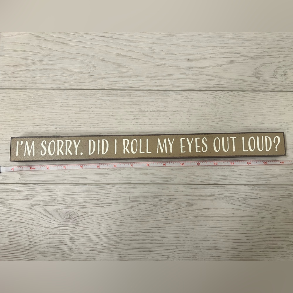 Tan Wooden Sign with White Text